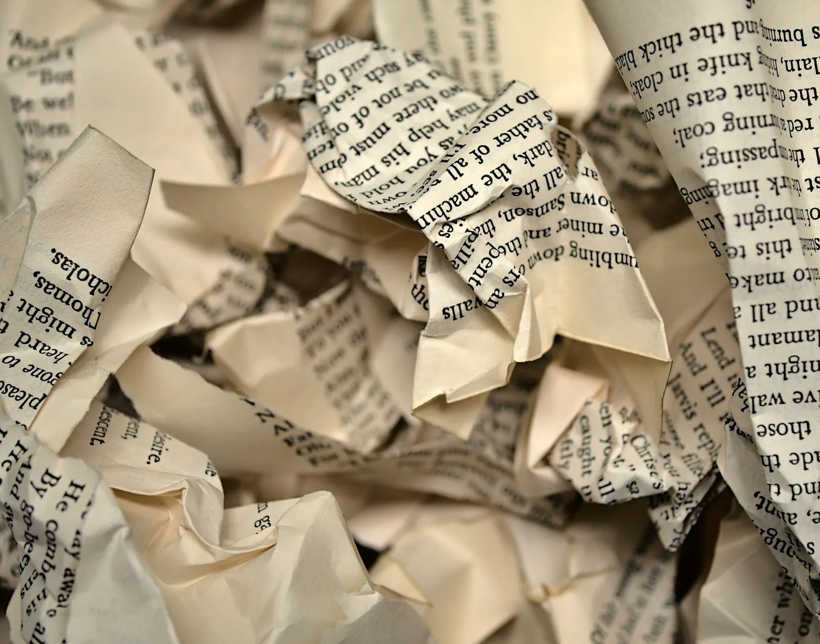 Folded paper representing pitfalls.